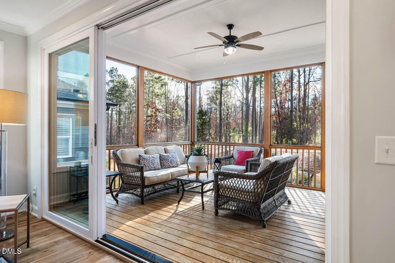 56 Post Oak Road Chapel Hill, NC 27516 - Photo 5 of 84 a living room with furniture and a floor to ceiling window