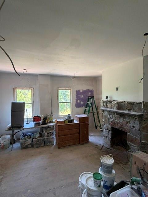 55 Pumpkin Center Road Finleyville, PA 15332 - Photo 12 of 29 a living room with furniture a fireplace and a flat screen tv