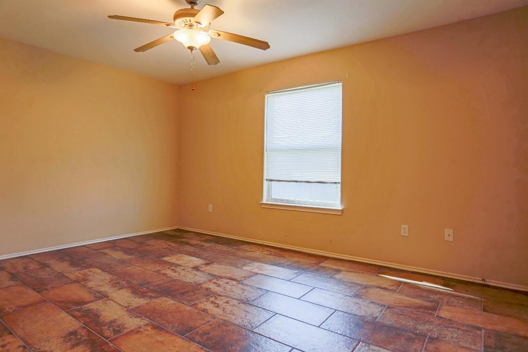 1114 Livermore Street Portland, TX 78374 - Photo 12 of 16 a view of an empty room with a window
