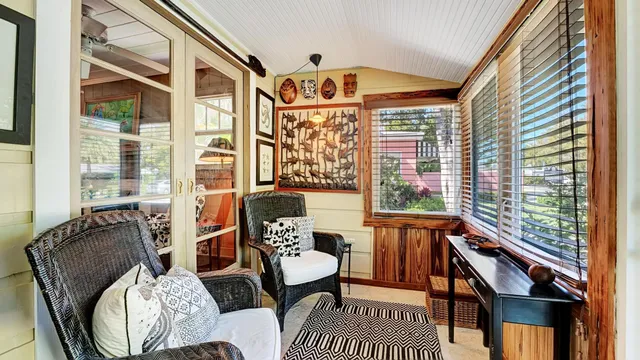 a living room with fireplace furniture and a fireplace