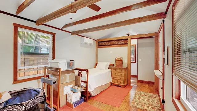 a front view of a house with a yard and porch