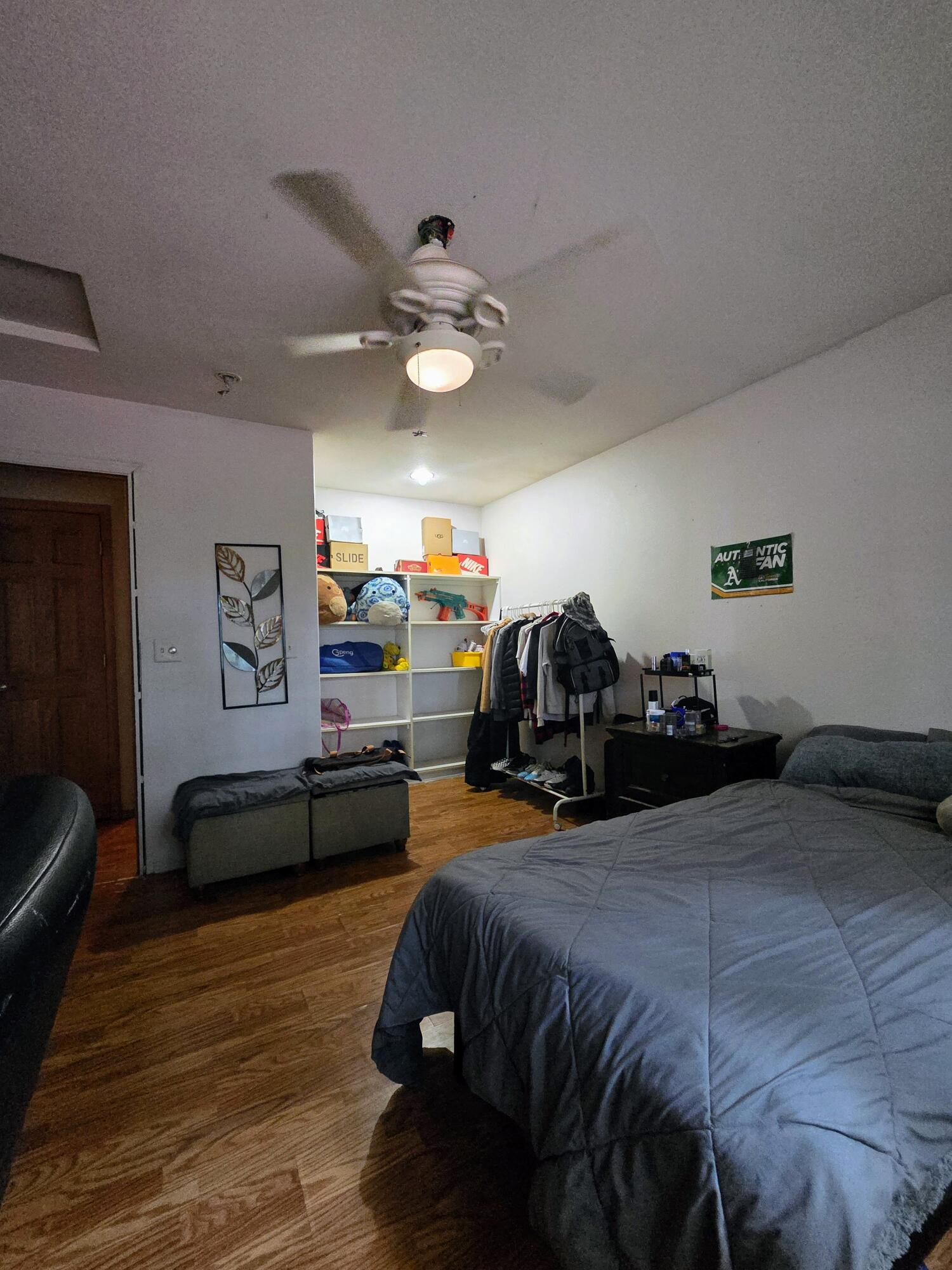 2940 Bear Creek Road Lewiston, CA 96052 - Photo 14 of 21 a bed room with furniture and a ceiling fan