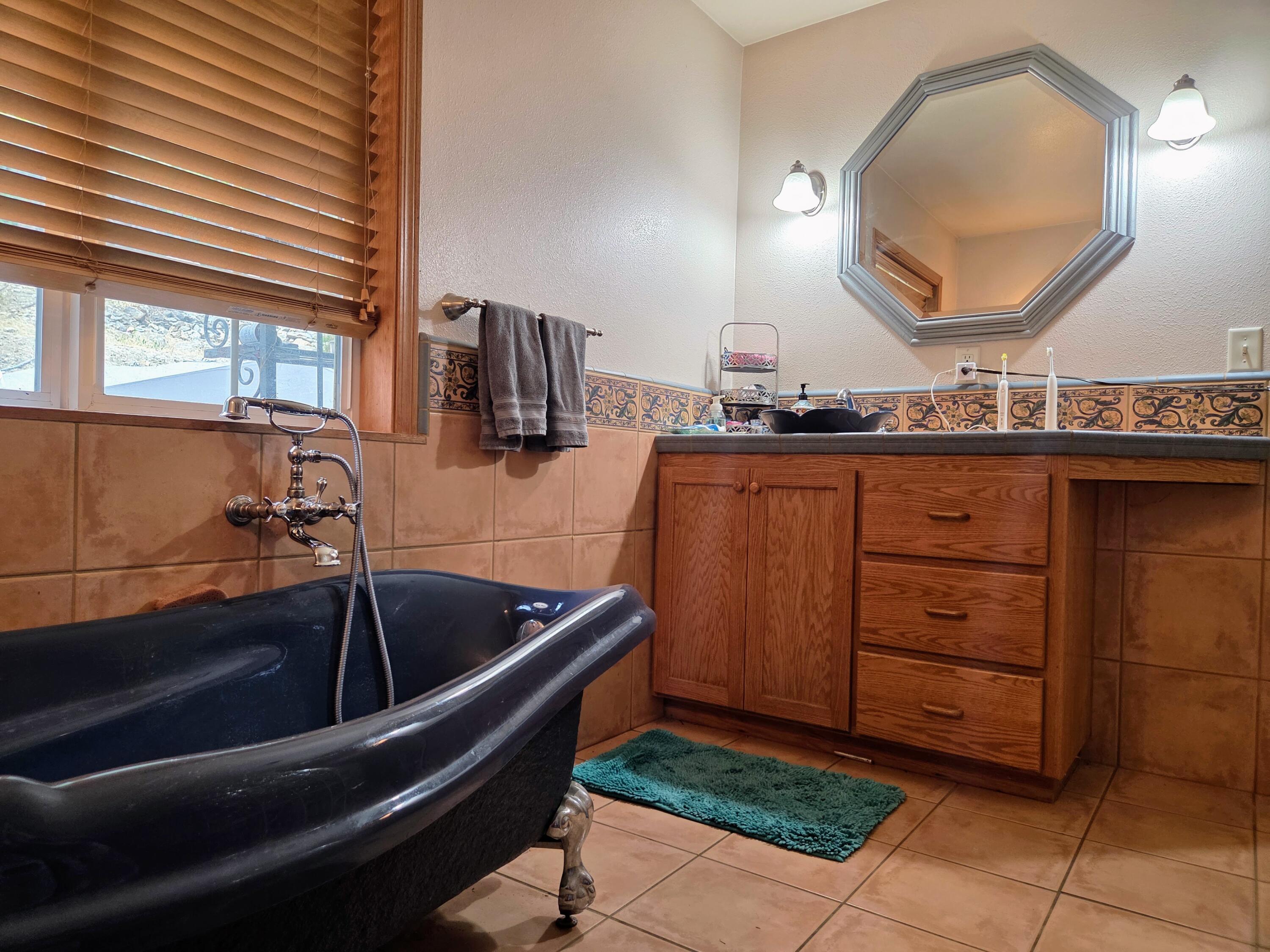 2940 Bear Creek Road Lewiston, CA 96052 - Photo 18 of 21 a bathroom with a sink and a mirror