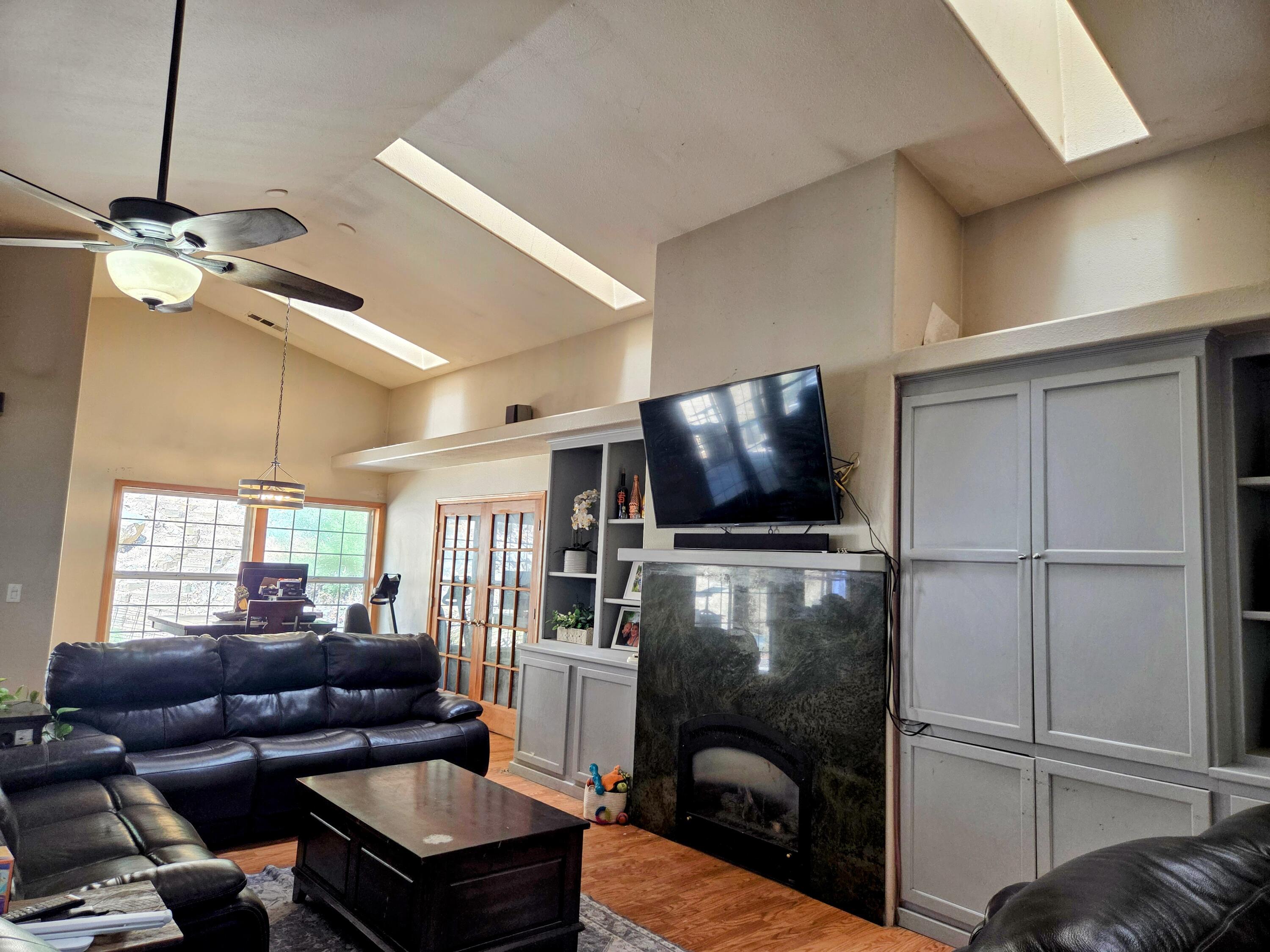 2940 Bear Creek Road Lewiston, CA 96052 - Photo 8 of 21 a living room with furniture and a flat screen tv