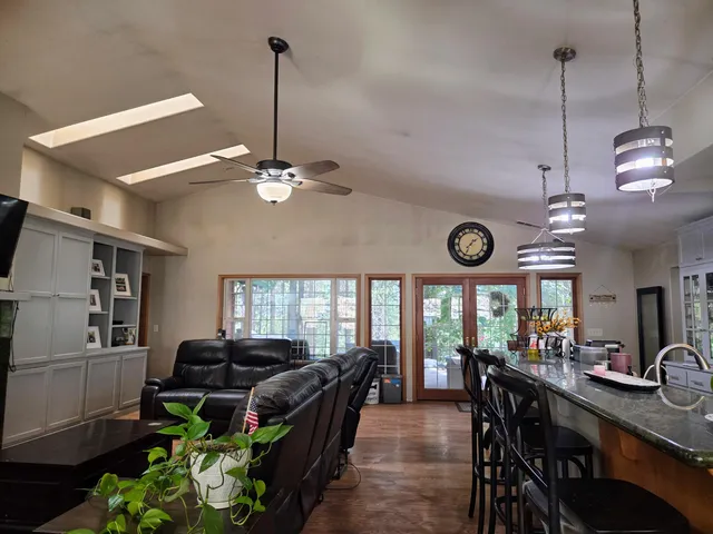 a bedroom with two beds and a window
