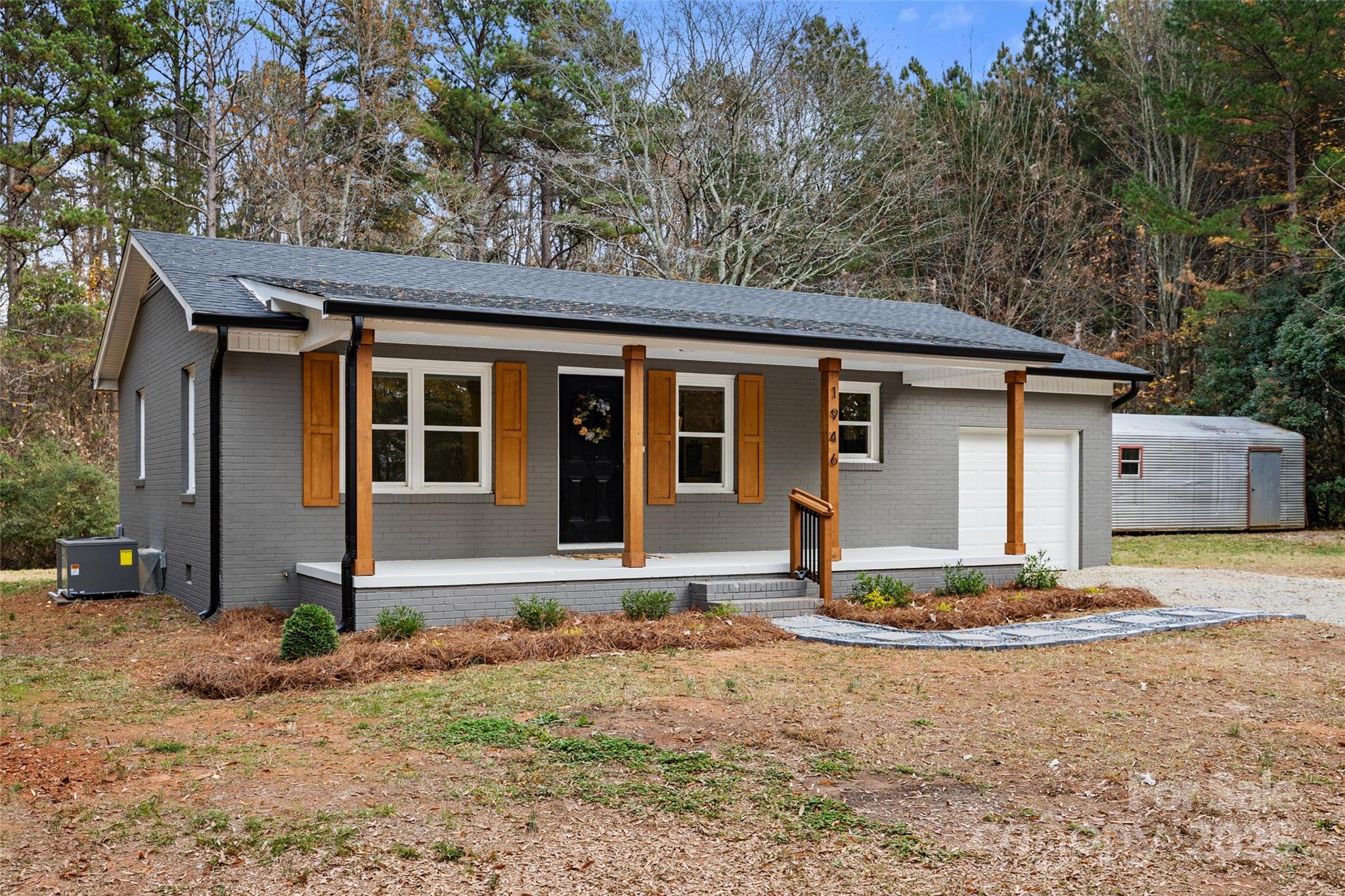 1946 Robert Usher Road Lancaster, SC 29720 - Photo 2 of 15 a front view of a house with a yard