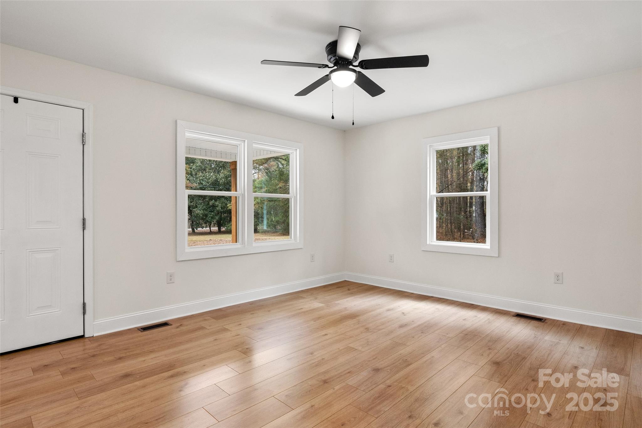 1946 Robert Usher Road Lancaster, SC 29720 - Photo 5 of 15 a view of a livingroom with a ceiling fan and window