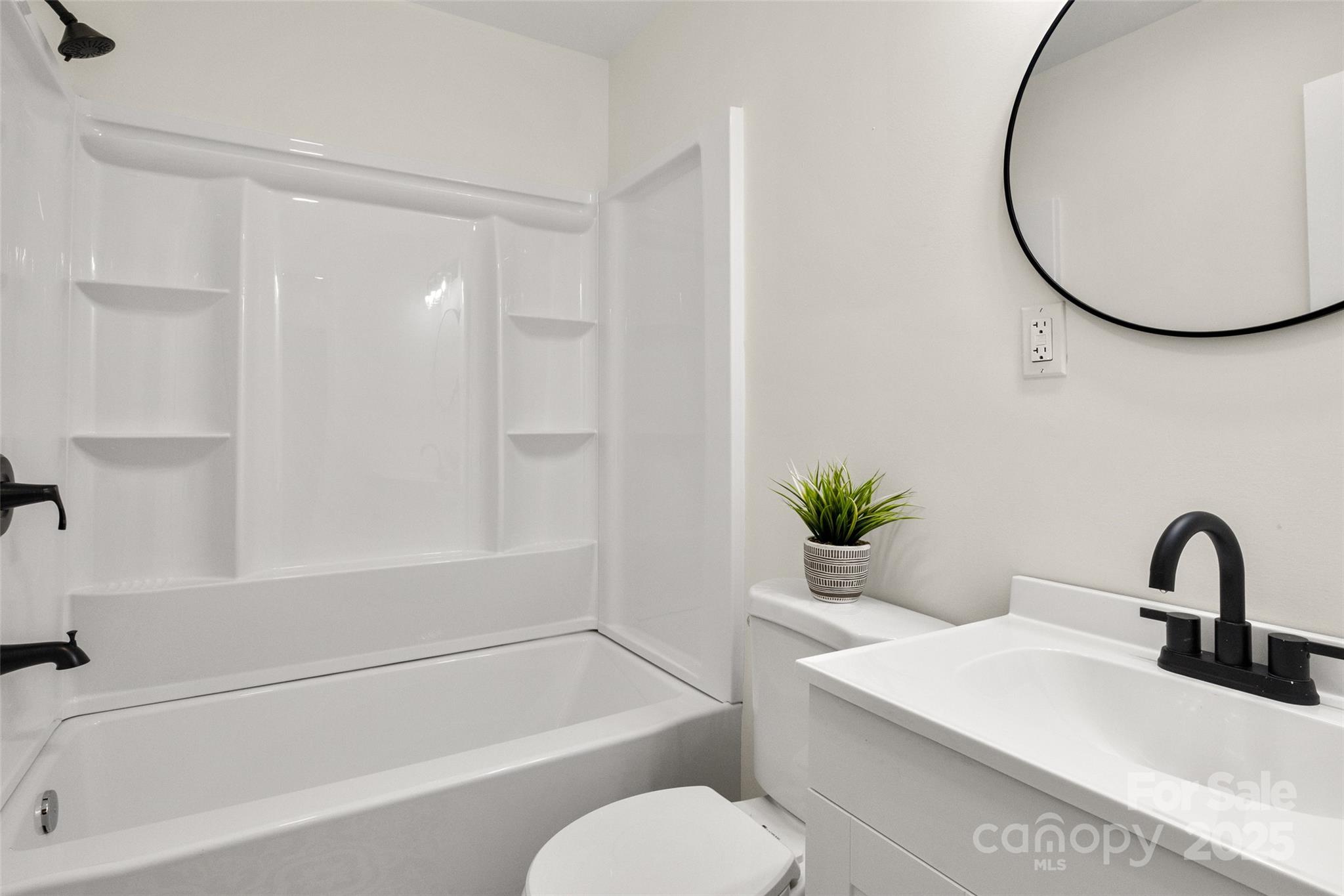 1946 Robert Usher Road Lancaster, SC 29720 - Photo 9 of 15 a bathroom with a sink toilet and a bathtub