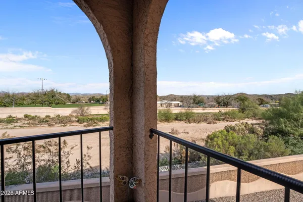 a view of a balcony with an outdoor space