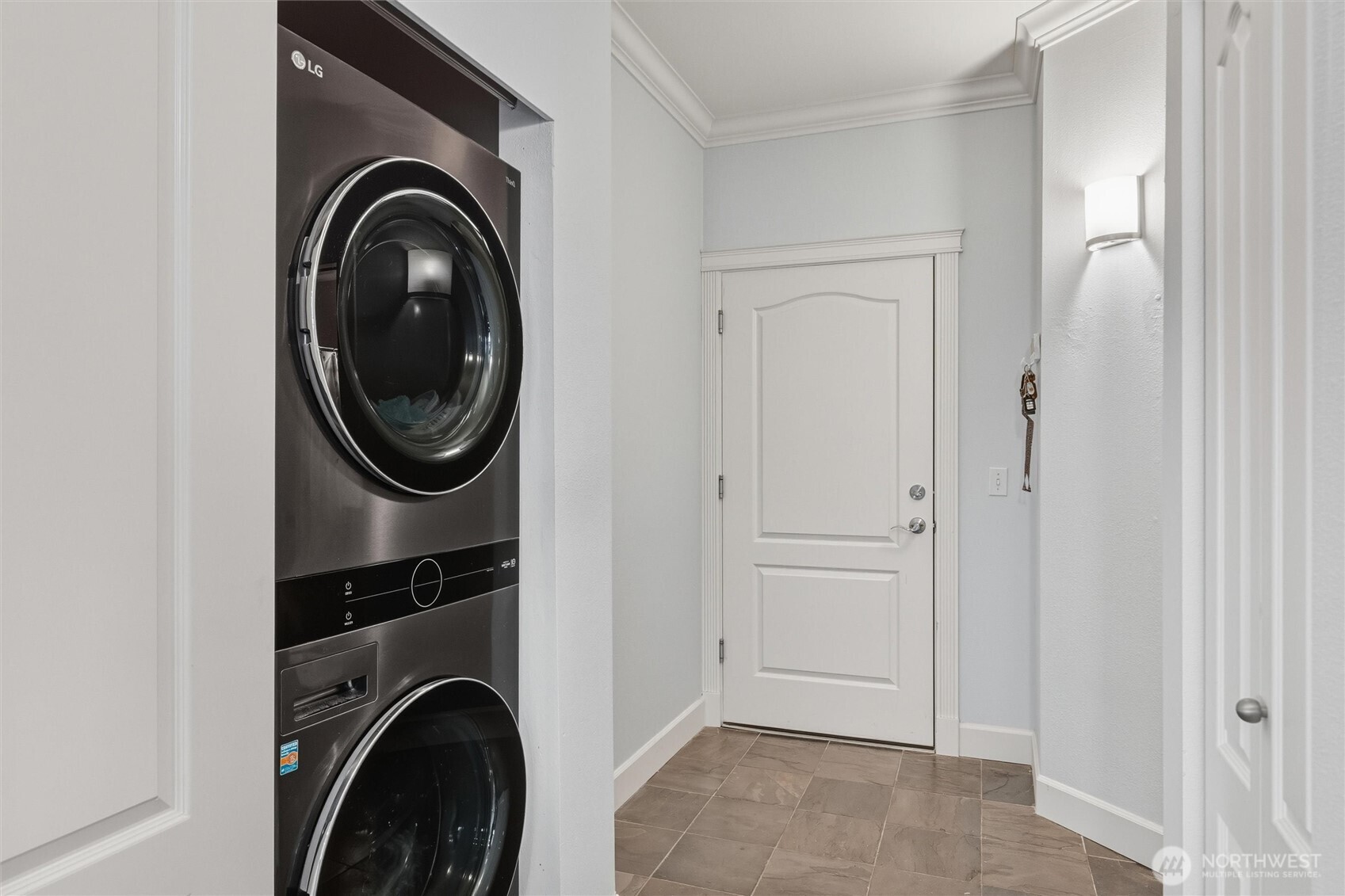 255 West Bakerview Road, Unit B103 Bellingham, WA 98226 - Photo 20 of 40 a view of a storage and utility room with washer and dryer