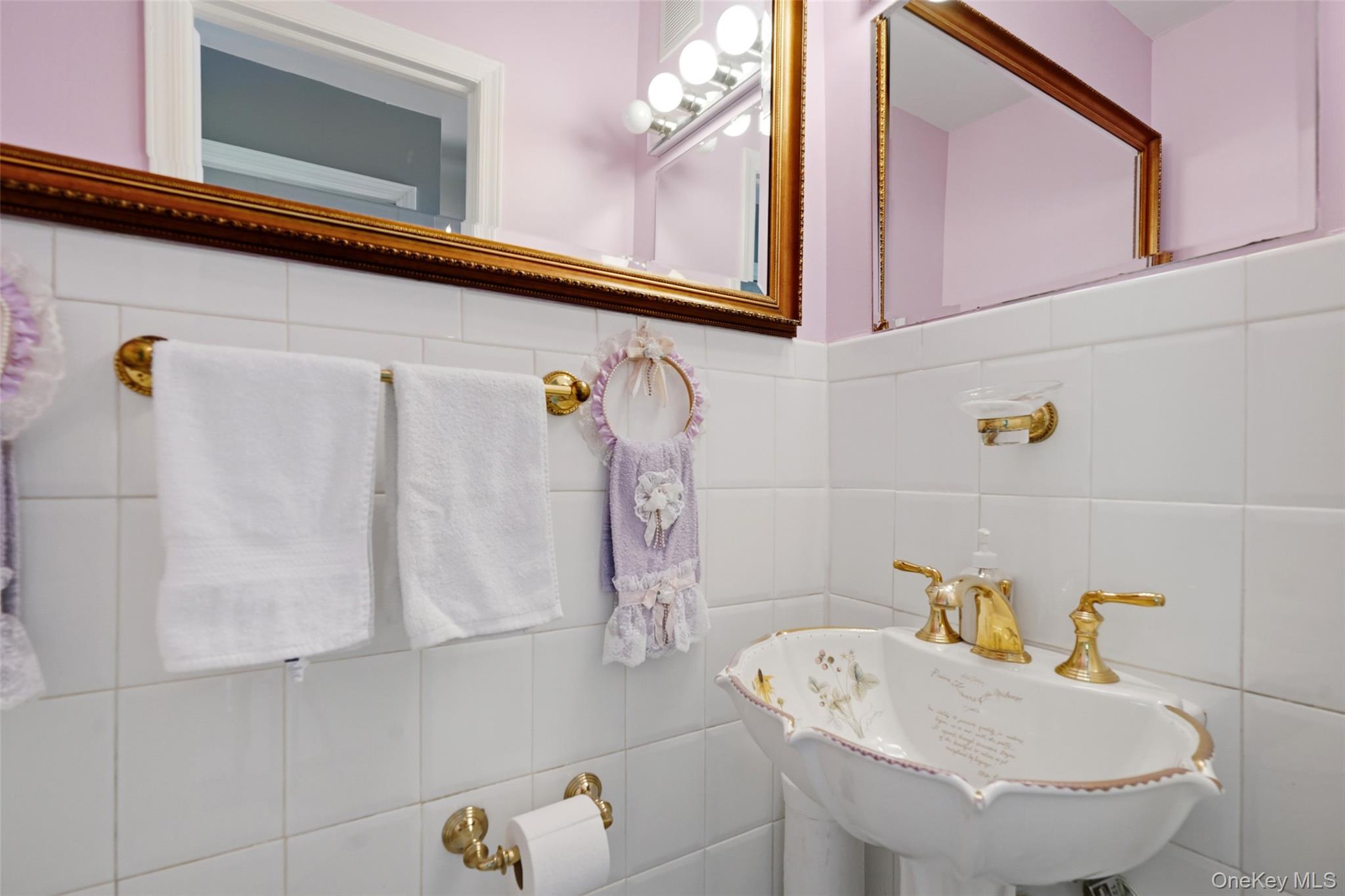 623 Cardinal Road Cortlandt Manor, NY 10567 - Photo 15 of 40 a bathroom with a sink and a mirror