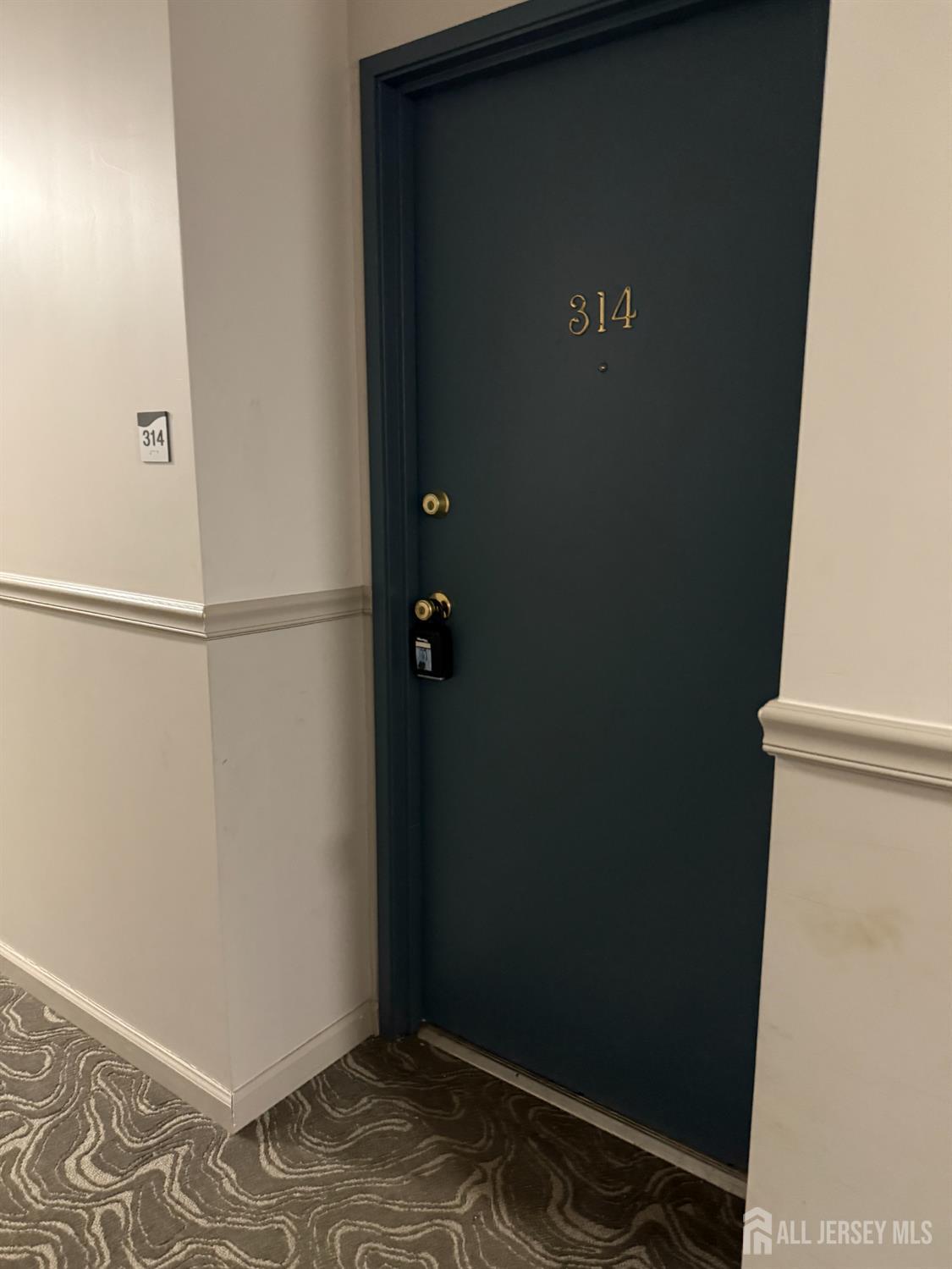 10 North Wood Avenue, Unit 314 Linden, NJ 07036 - Photo 15 of 18 a view of cupboard