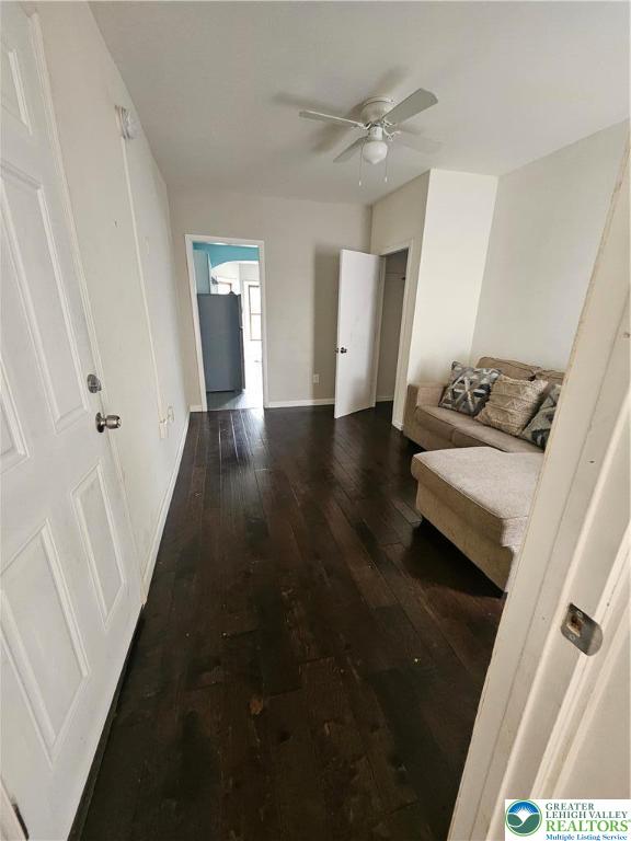 438 North 7th Street, Unit 2 Allentown, PA 18102 - Photo 3 of 6 a view of a hallway to a livingroom with furniture wooden floor and window