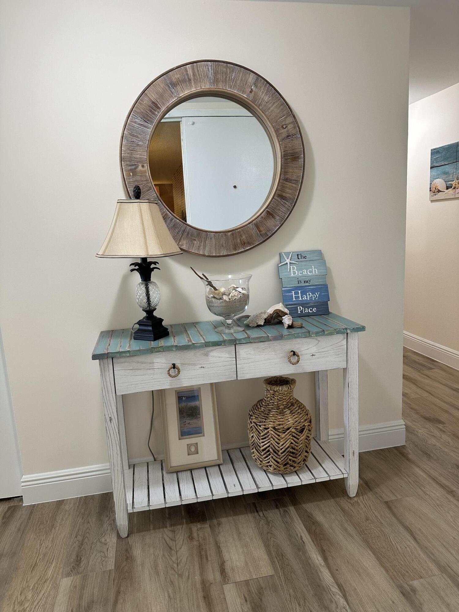 3100 North Hwy A1A, Unit 502 Fort Pierce, FL 34949 - Photo 16 of 44 an entryway with wooden floor