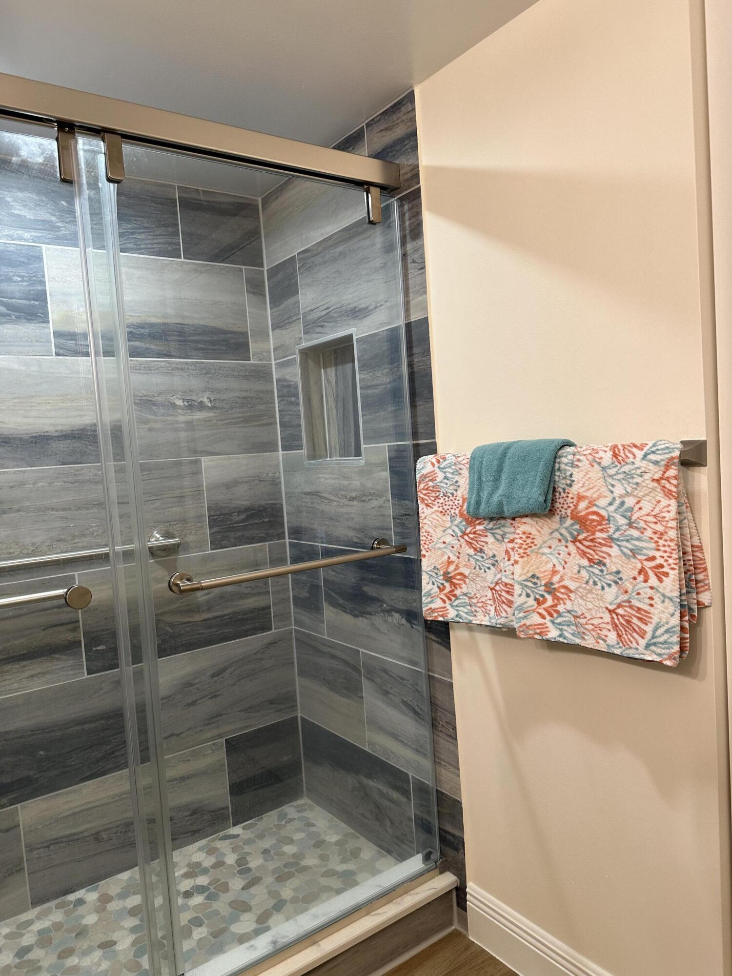 3100 North Hwy A1A, Unit 502 Fort Pierce, FL 34949 - Photo 20 of 44 a bathroom with a shower and a sink