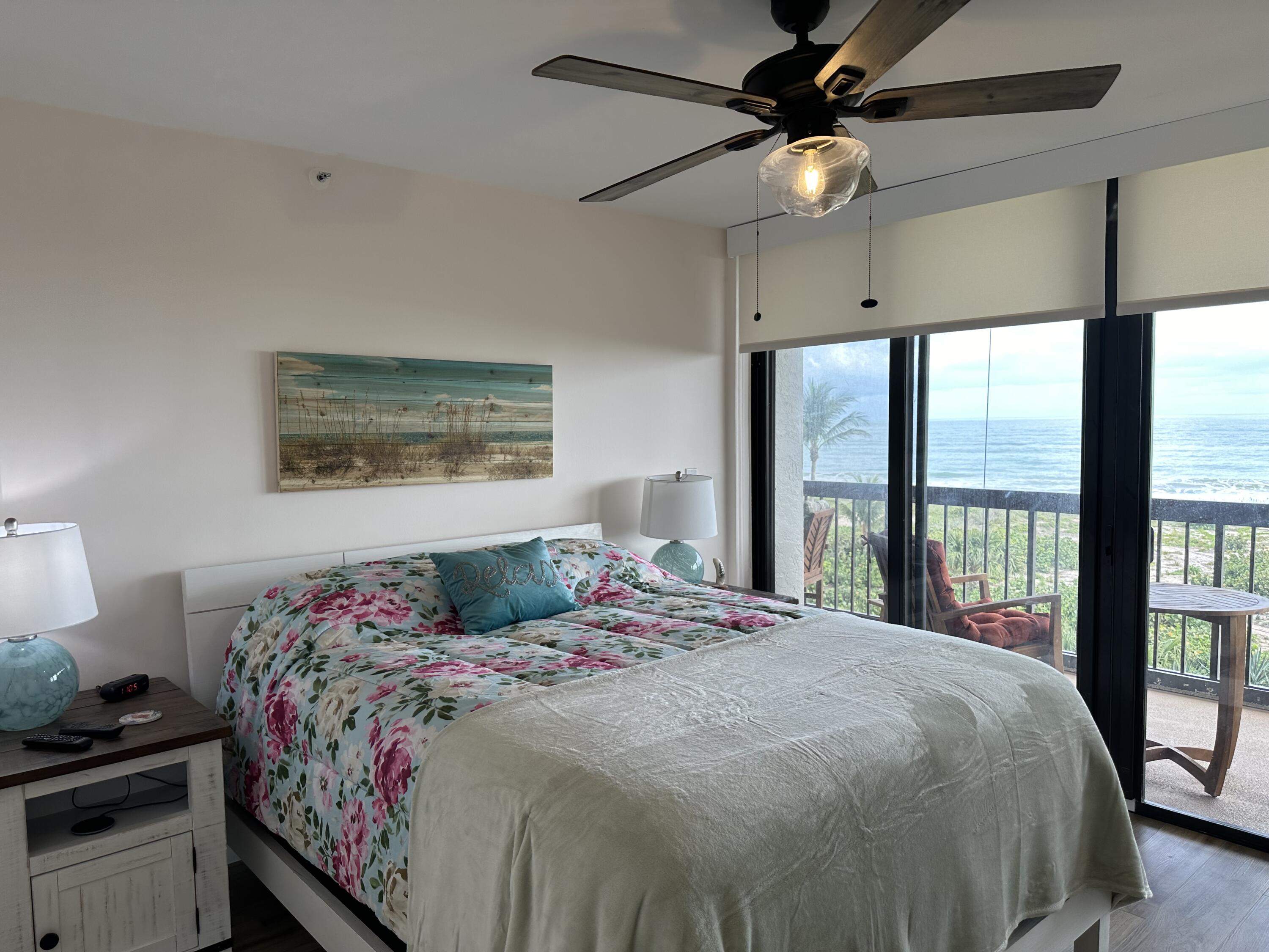 3100 North Hwy A1A, Unit 502 Fort Pierce, FL 34949 - Photo 21 of 44 a bedroom with a large bed and a window