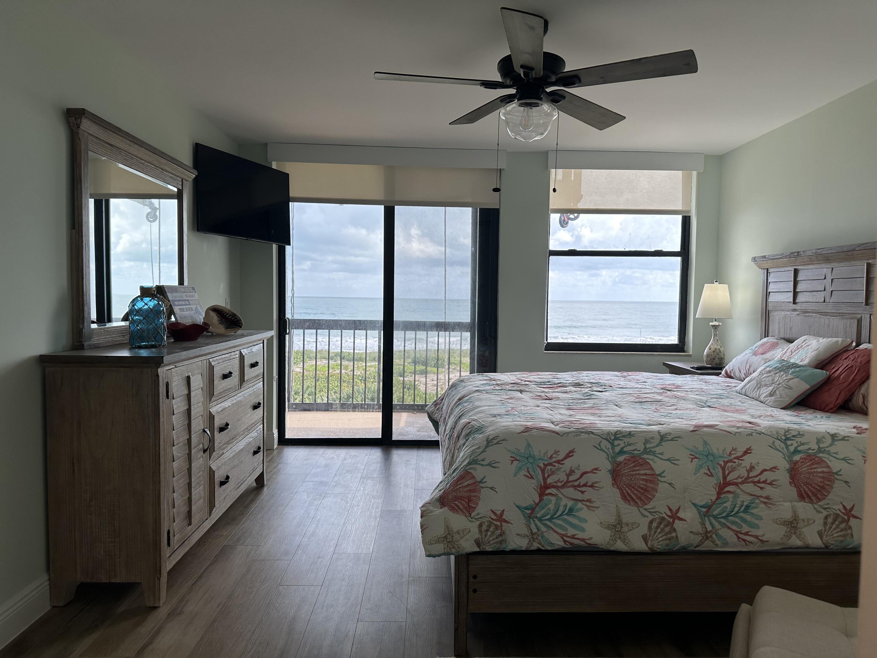 3100 North Hwy A1A, Unit 502 Fort Pierce, FL 34949 - Photo 26 of 44 a bedroom with a bed and a window