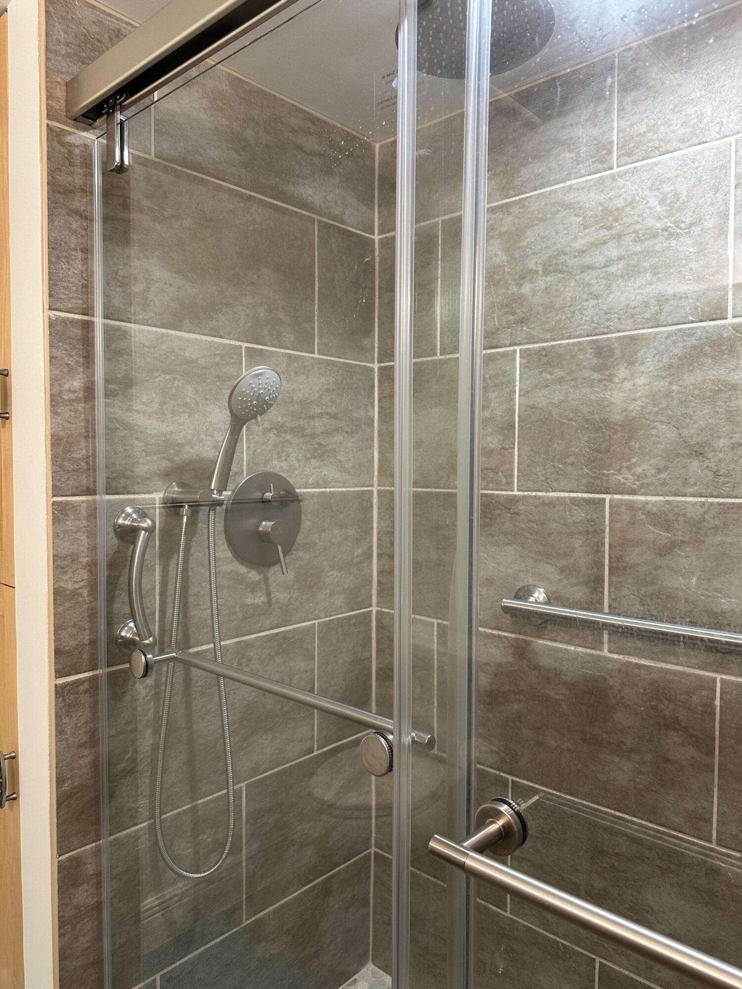 3100 North Hwy A1A, Unit 502 Fort Pierce, FL 34949 - Photo 30 of 44 a bathroom with a shower