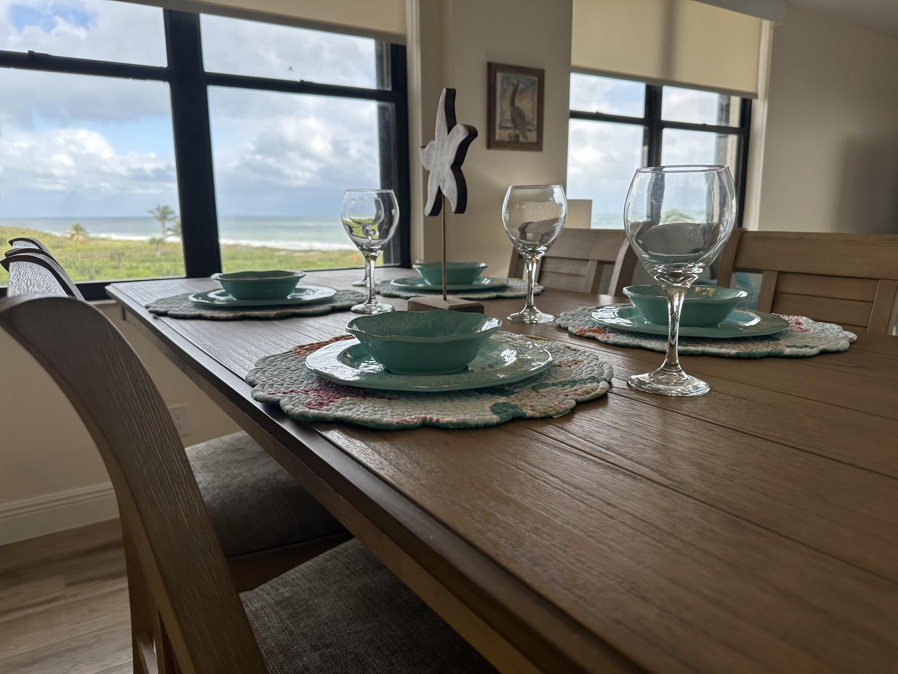 3100 North Hwy A1A, Unit 502 Fort Pierce, FL 34949 - Photo 9 of 44 a dining room with furniture