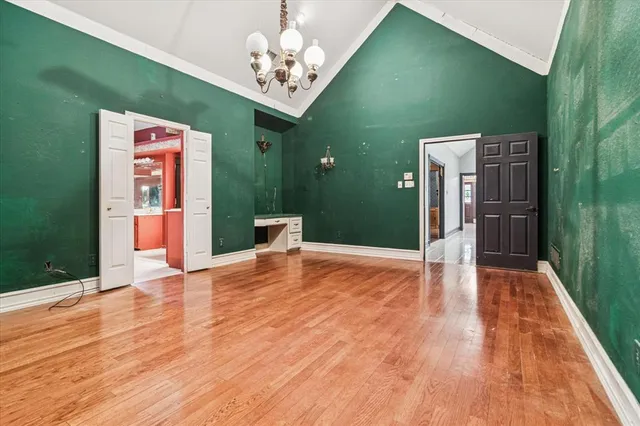 a view of livingroom with hardwood and furniture