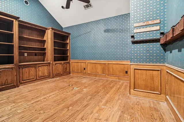 a view of a hardwood & utility room