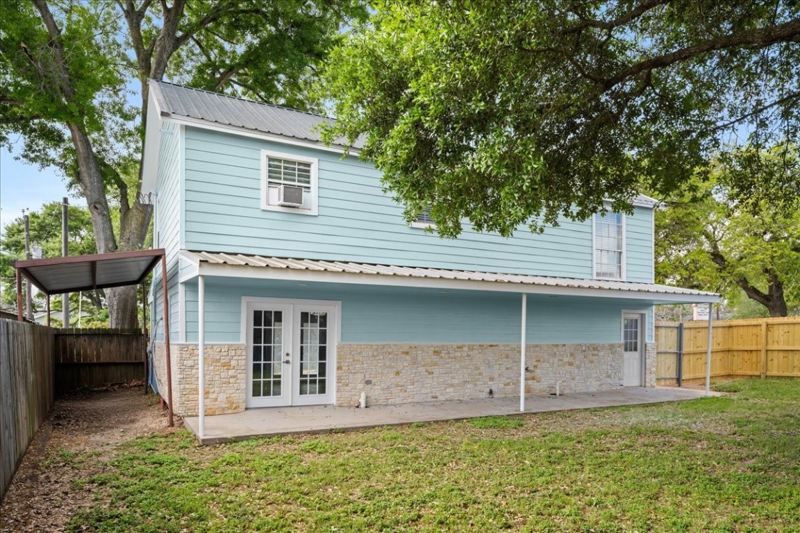 103 Emile Street Brenham, TX 77833 - Photo 21 of 22 a view of a house with a yard and large tree