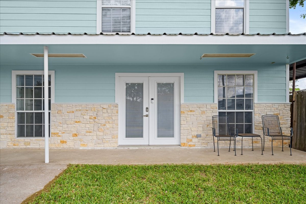 103 Emile Street Brenham, TX 77833 - Photo 4 of 22 a front view of a house with a yard