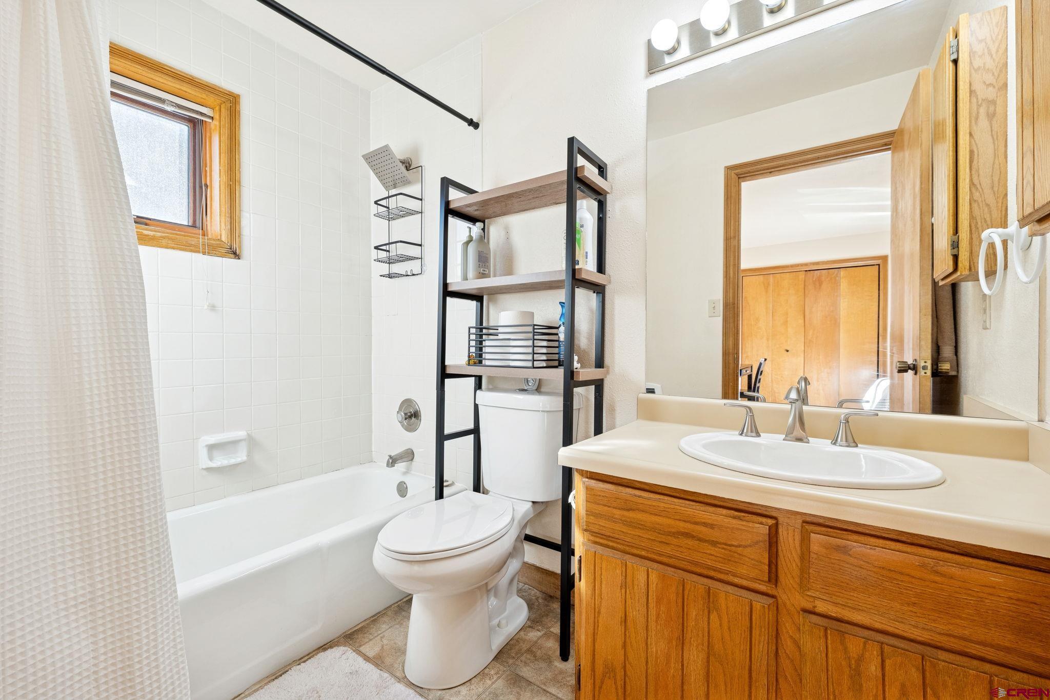 6 Ferringway Circle, Unit 18 Durango, CO 81301 - Photo 16 of 39 a bathroom with a sink a toilet and shower