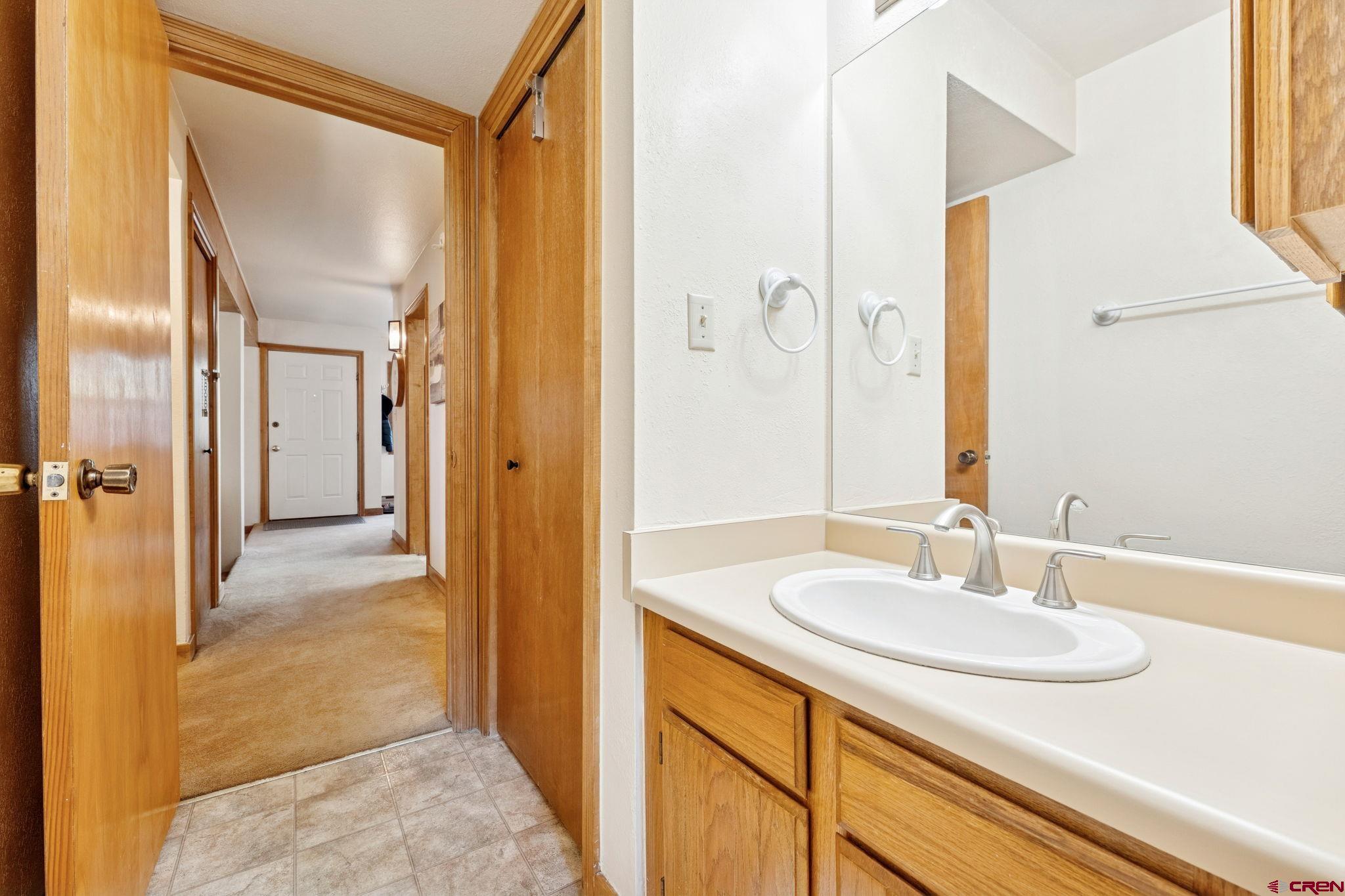6 Ferringway Circle, Unit 18 Durango, CO 81301 - Photo 21 of 39 a bathroom with a sink and a mirror