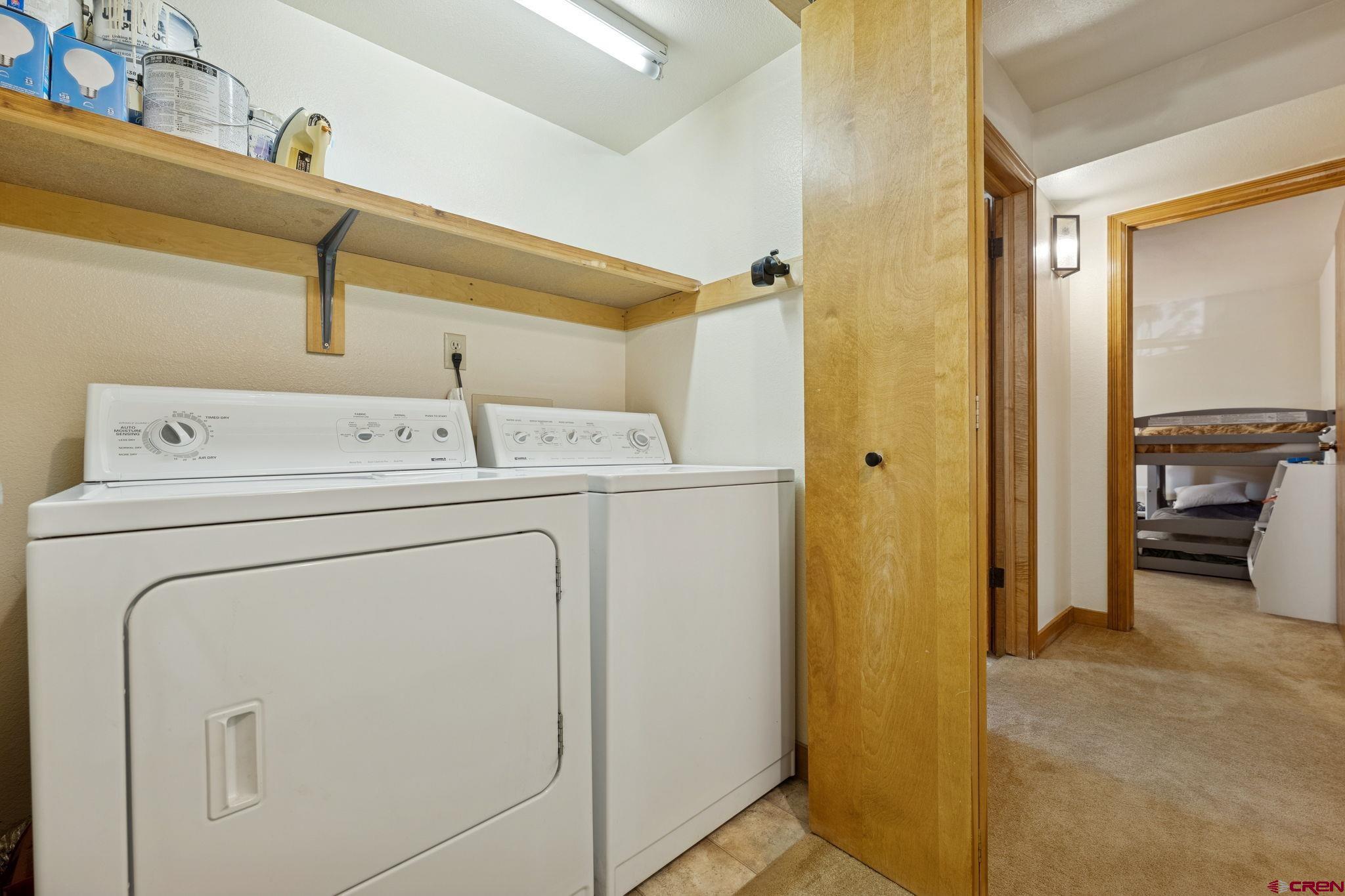 6 Ferringway Circle, Unit 18 Durango, CO 81301 - Photo 23 of 39 a utility room with dryer and washer