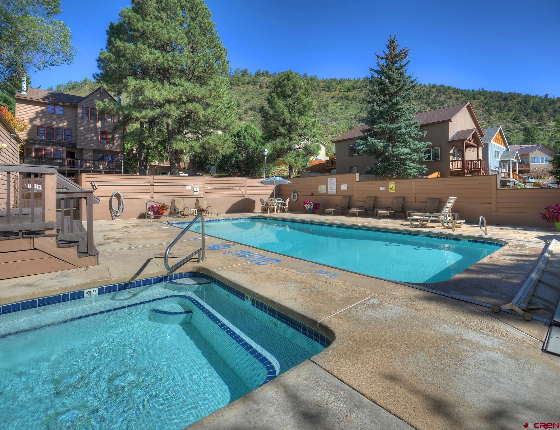 6 Ferringway Circle, Unit 18 Durango, CO 81301 - Photo 31 of 39 a view of a swimming pool with a yard