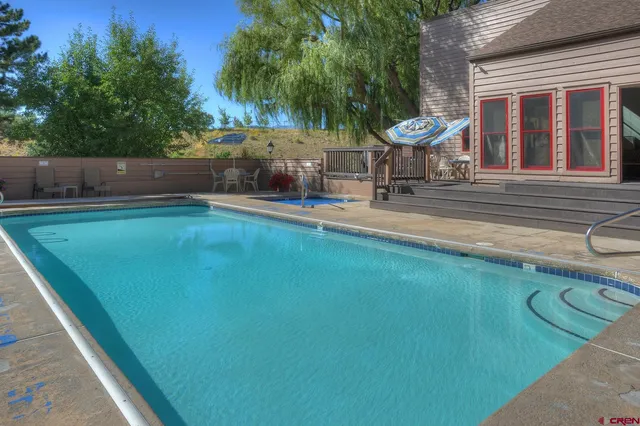 a view of room with wooden floor