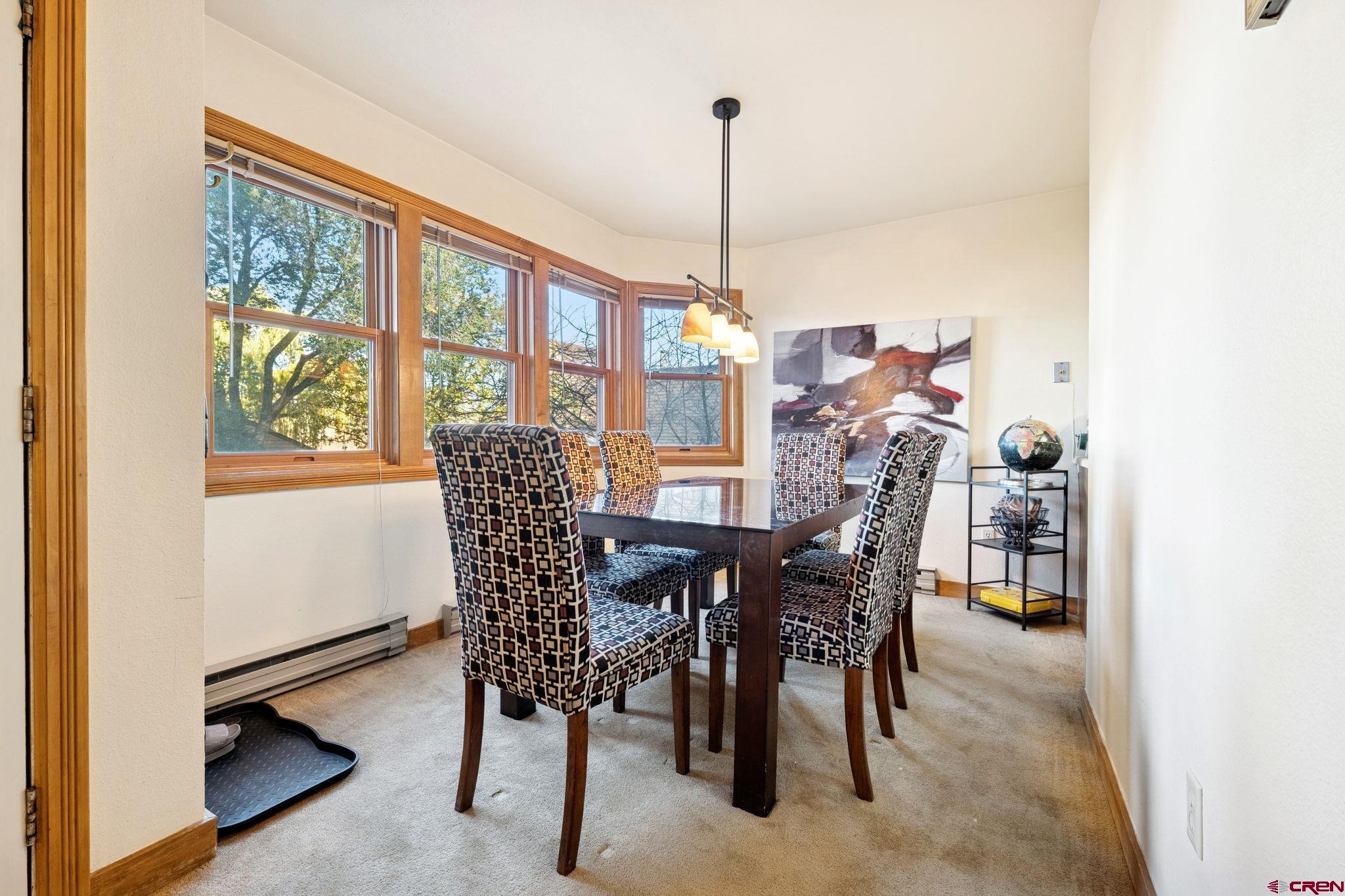 6 Ferringway Circle, Unit 18 Durango, CO 81301 - Photo 10 of 39 a view of a dining room with furniture window and outside view