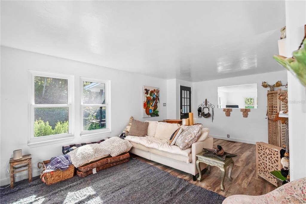 22924 Northwest 91st Court Road Micanopy, FL 32667 - Photo 13 of 95 a bedroom with furniture and a window