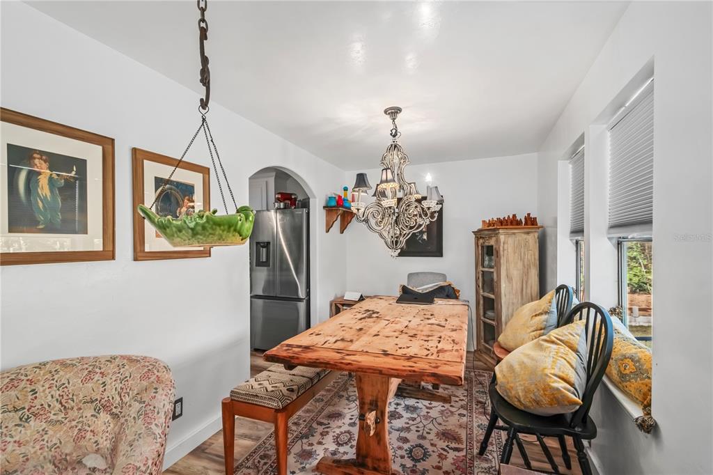 22924 Northwest 91st Court Road Micanopy, FL 32667 - Photo 14 of 95 a view of a dining room with furniture