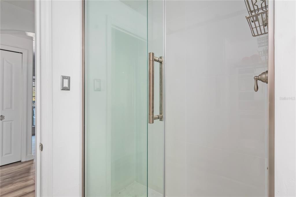 22924 Northwest 91st Court Road Micanopy, FL 32667 - Photo 27 of 95 a bathroom with a shower