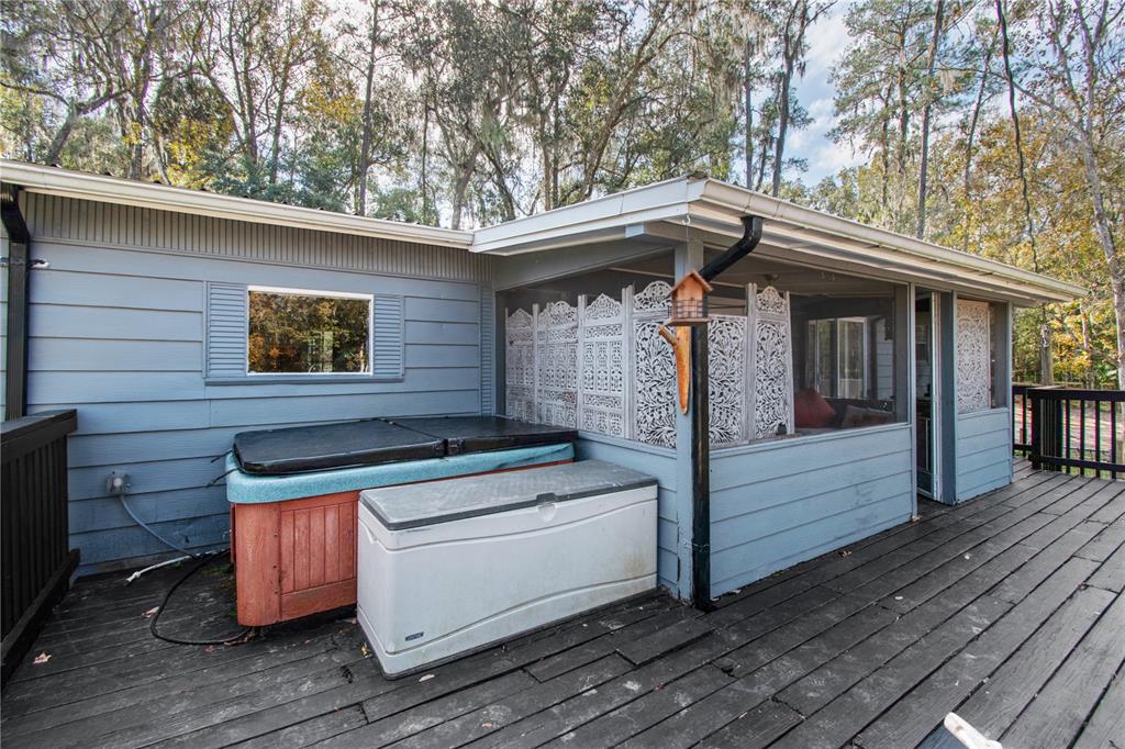 22924 Northwest 91st Court Road Micanopy, FL 32667 - Photo 41 of 95 a view of sitting area in front of house