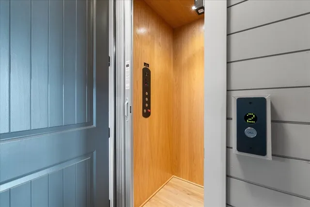a bathroom with a sink a mirror and a shower