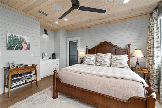 a view of a patio with a dining table and chairs