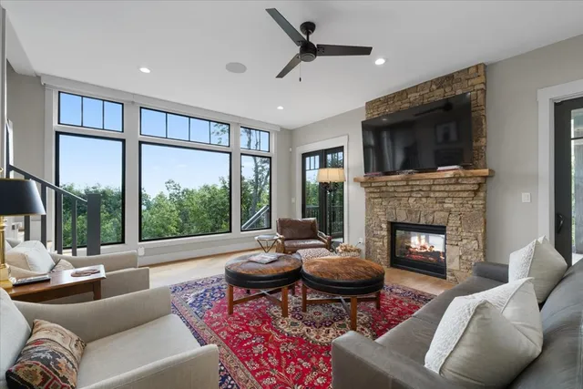 a swimming pool with outdoor seating yard and livingroom