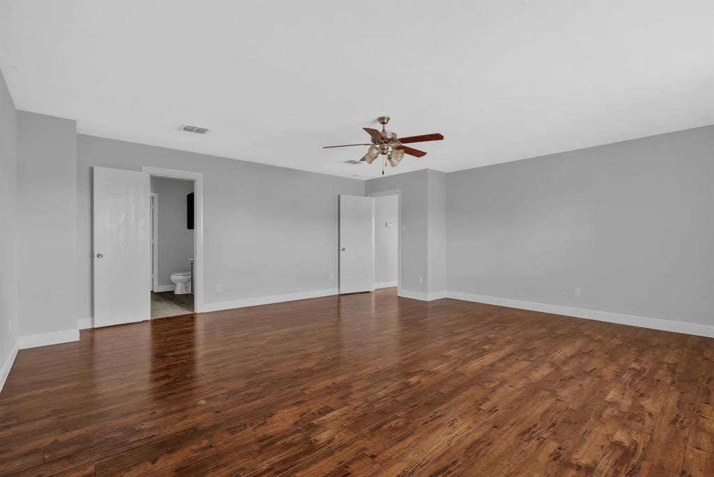 1725 Willow Way Anna, TX 75409 - Photo 23 of 33 a view of an empty room with wooden floor