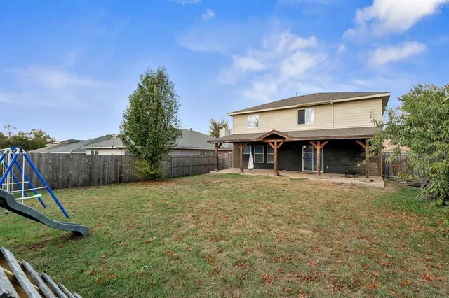 a view of house with an outdoor space