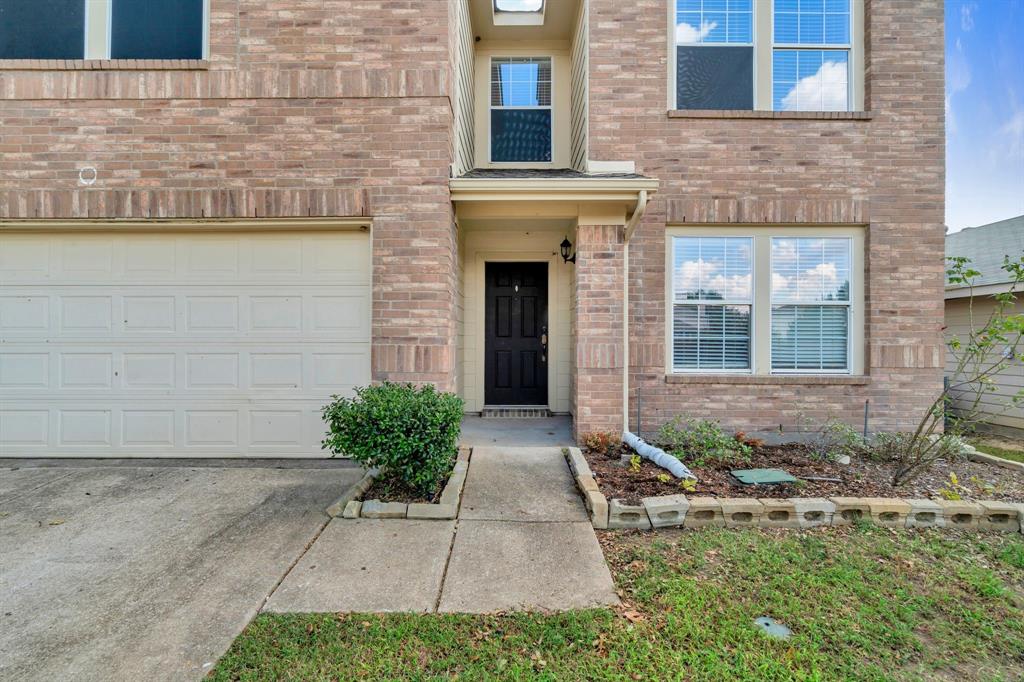 1725 Willow Way Anna, TX 75409 - Photo 4 of 33 a front view of a house with garden