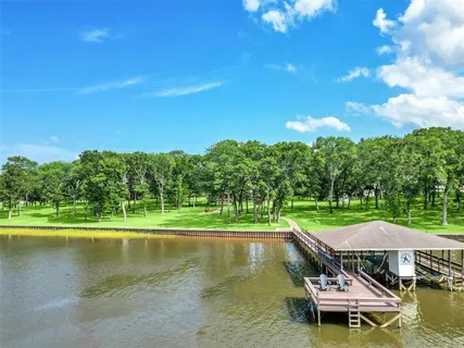 a view of lake with green space