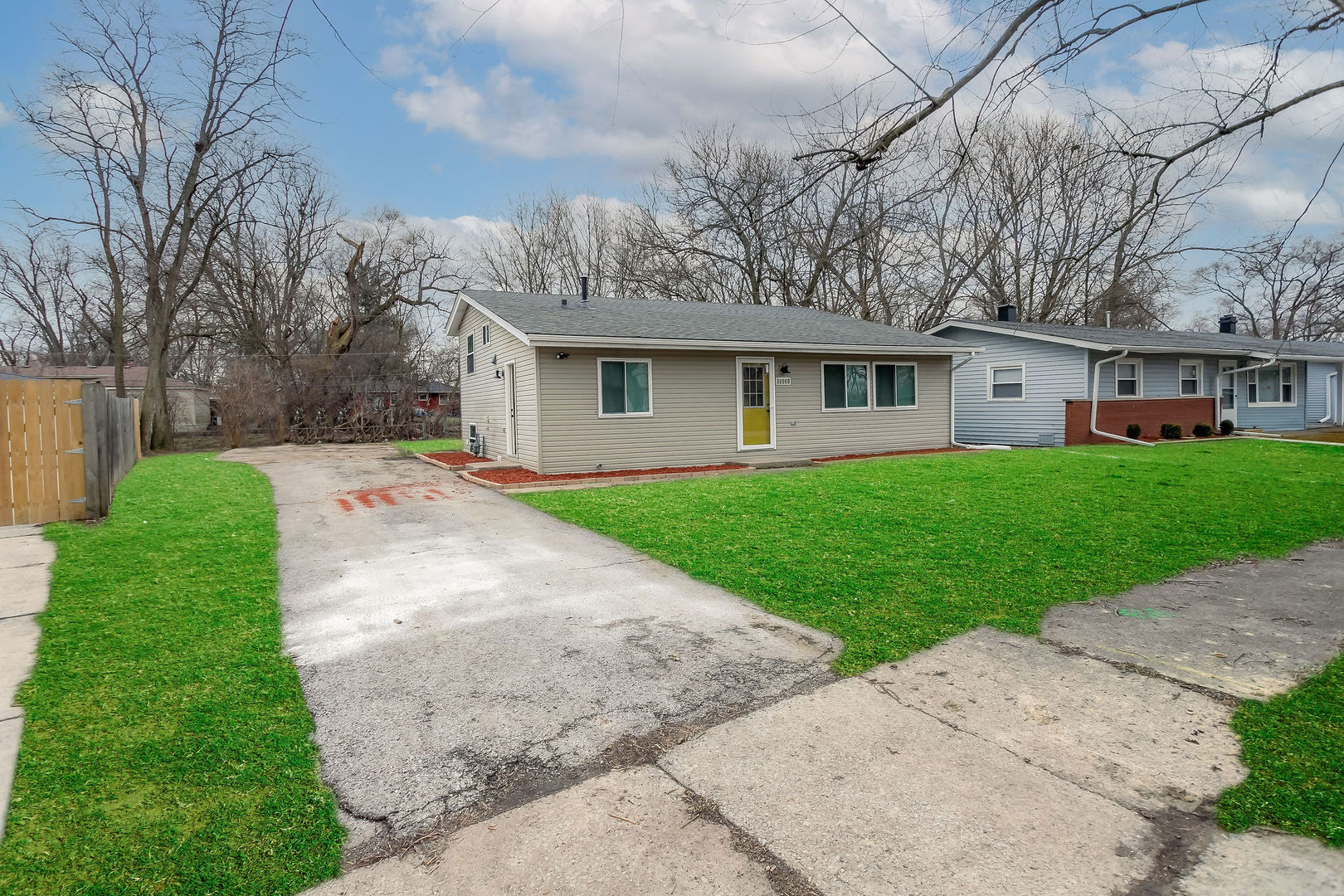 15331 Cherry Lane Markham, IL 60428 - Photo 2 of 13 front view of a house with a yard