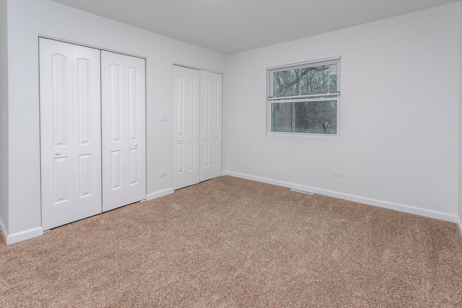 15331 Cherry Lane Markham, IL 60428 - Photo 8 of 13 a view of an empty room with closet and hallway