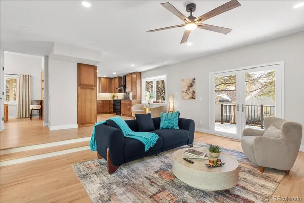 a living room with furniture and a table