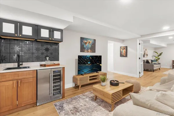 a bedroom with a bed and a potted plant