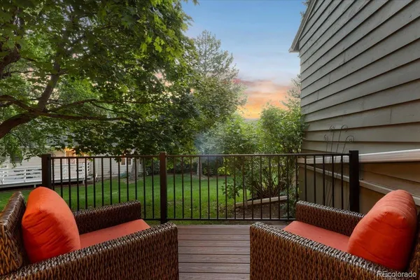 an aerial view of residential house with outdoor space and parking