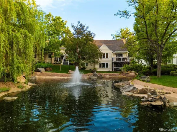 a view of a garden with a fountain